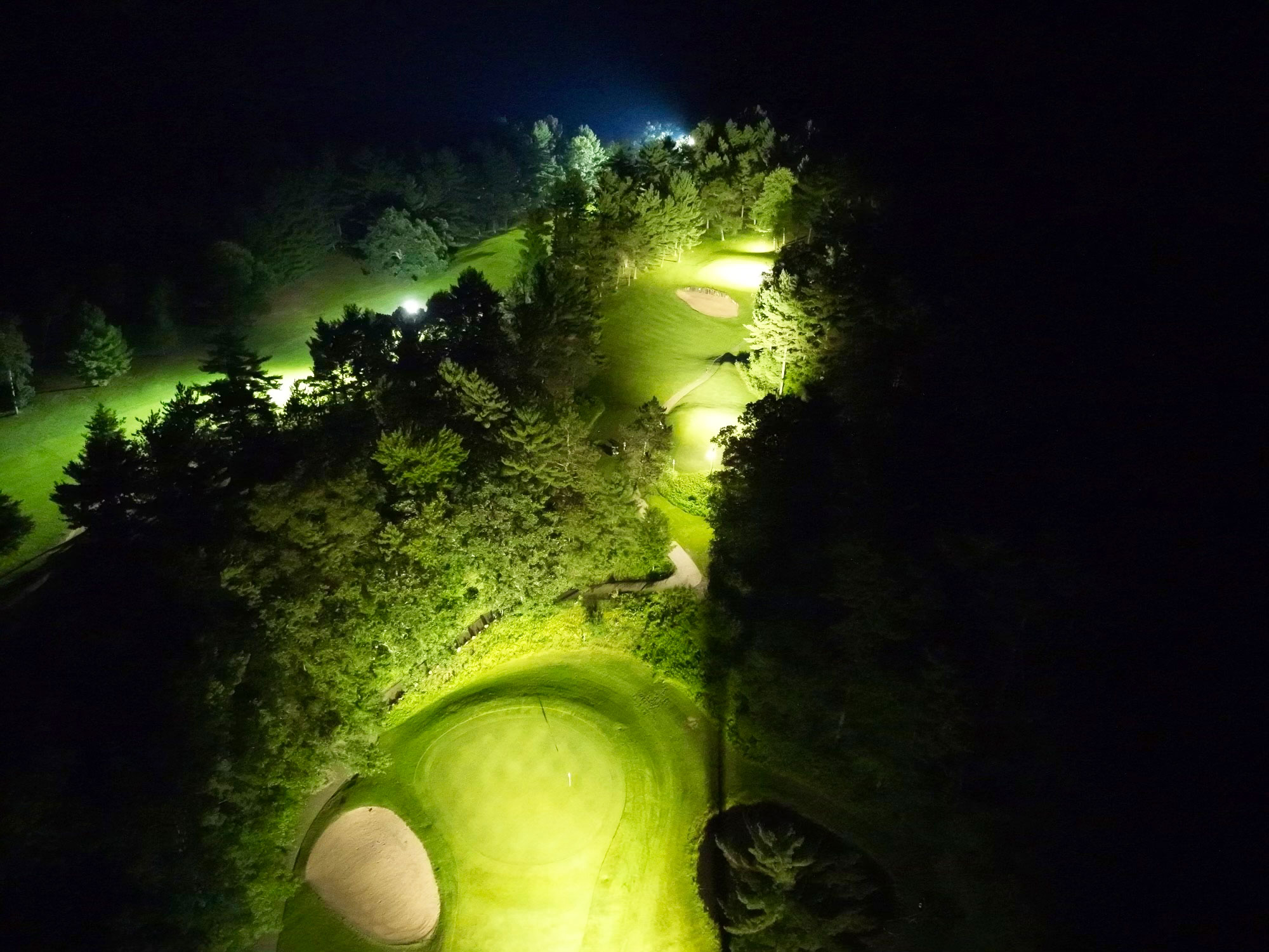 The Ridges Golf Course lit up with spotlights at night