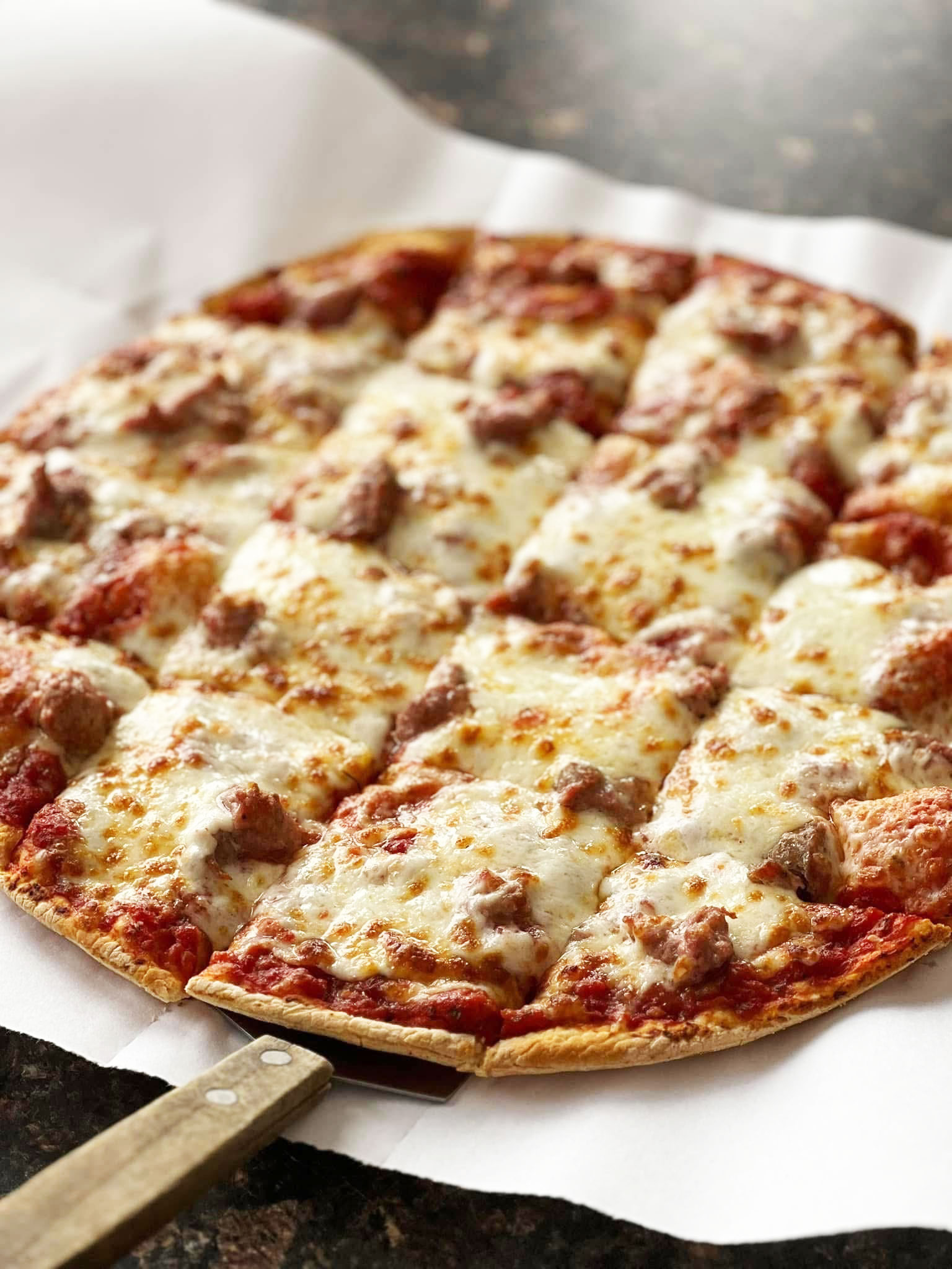 Pizza topped with sausage