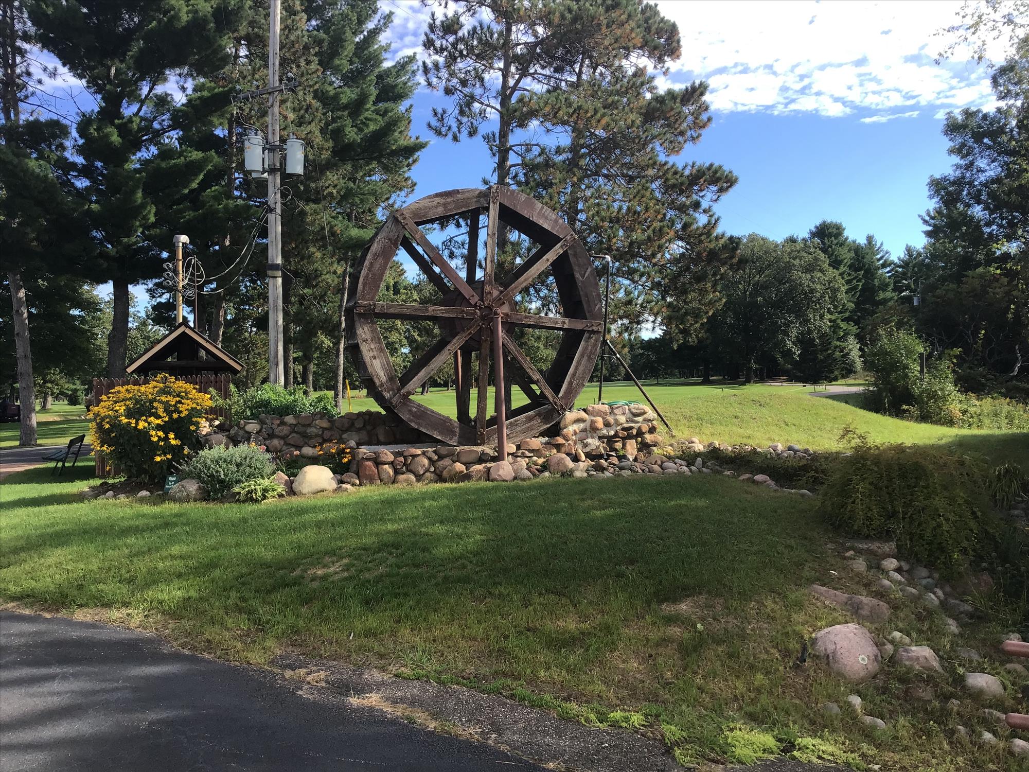 Water wheel surrounded by stone walls
