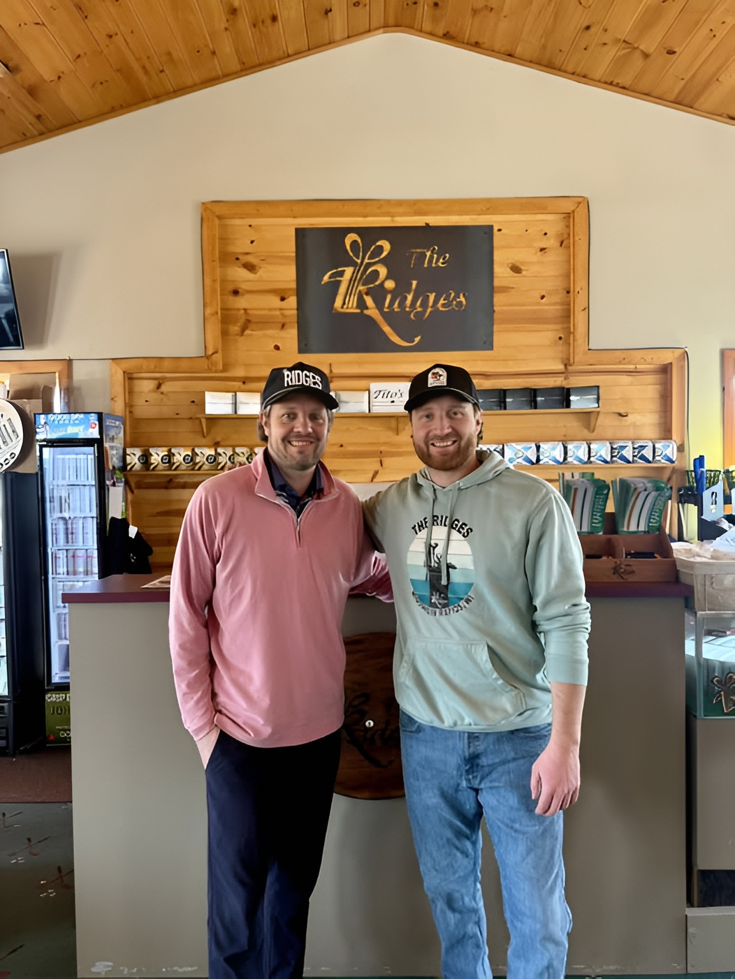 Head Golf Professional Ethan Anderson inside the pro shop at The Ridges Golf Course