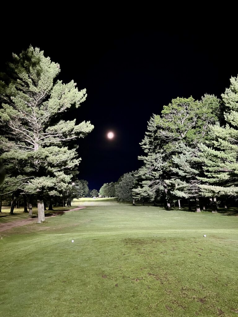 The Ridges Golf Course lit up with spotlights at night