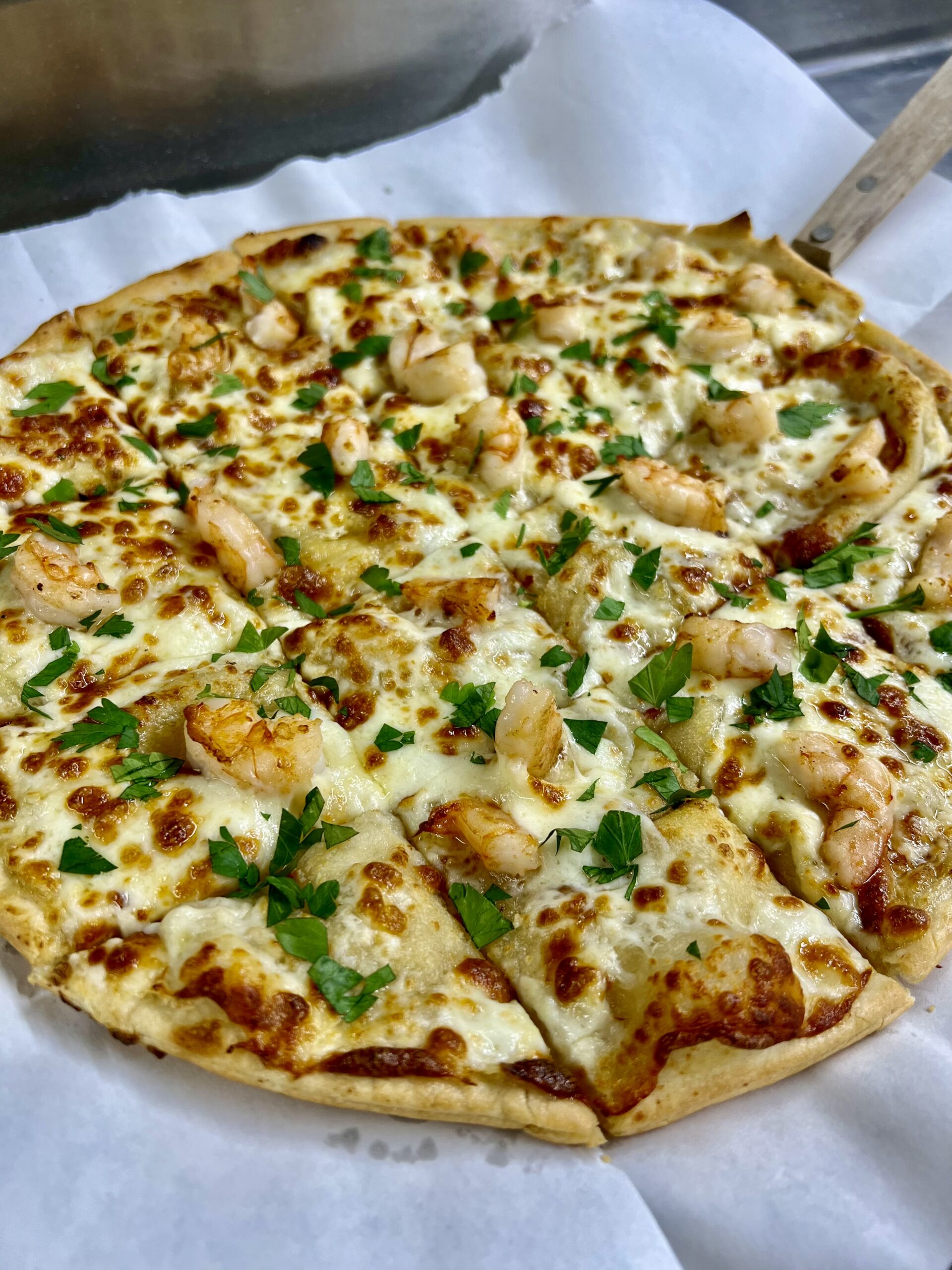 Pizza topped with shrimp