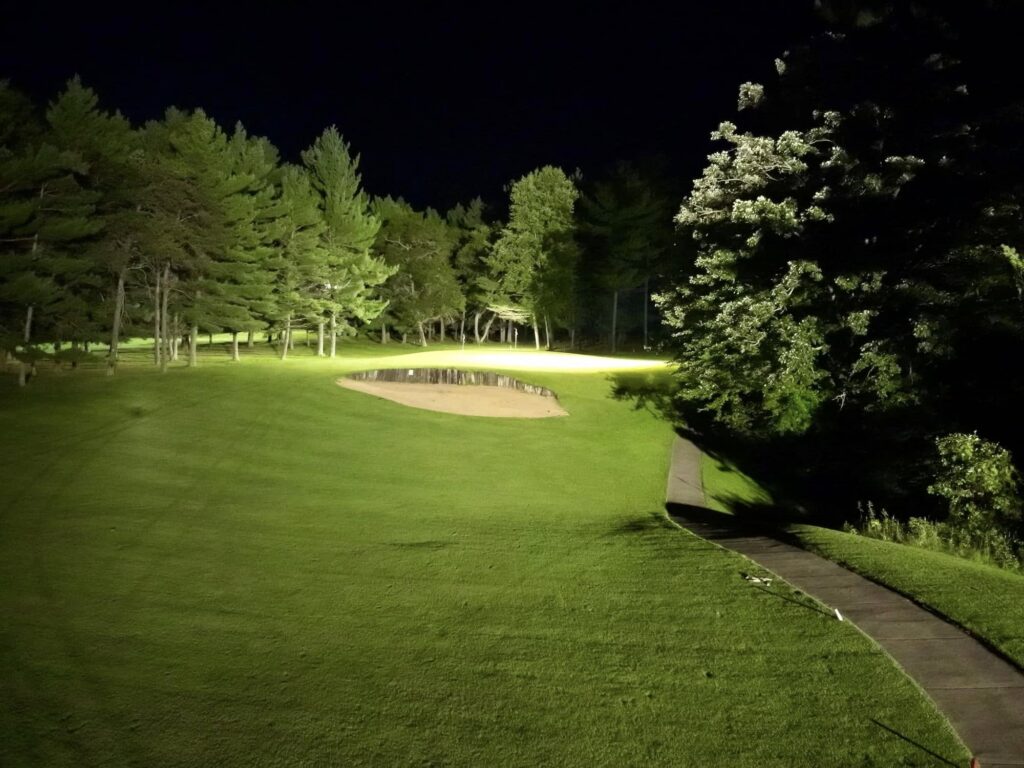 The Ridges Golf Course lit up with spotlights at night