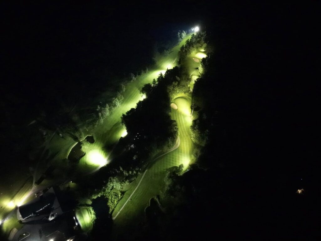 The Ridges Golf Course lit up with spotlights at night